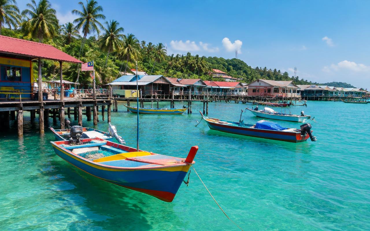 Colourful fishing boats in a Pangkor Island village